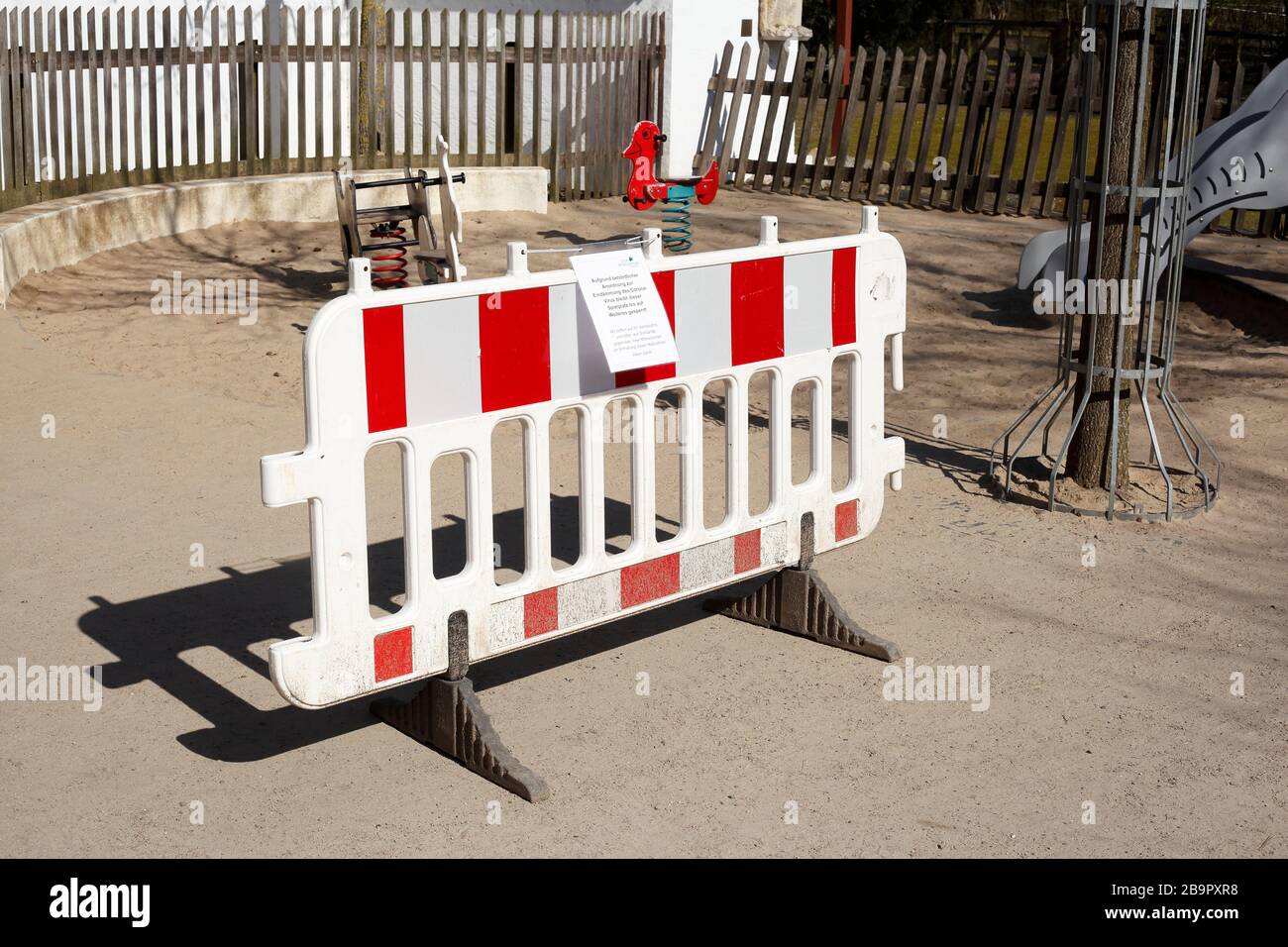 Playground, barrier, sign of playground closed due to corona virus, forbidden to enter, Germany, Europe Stock Photo