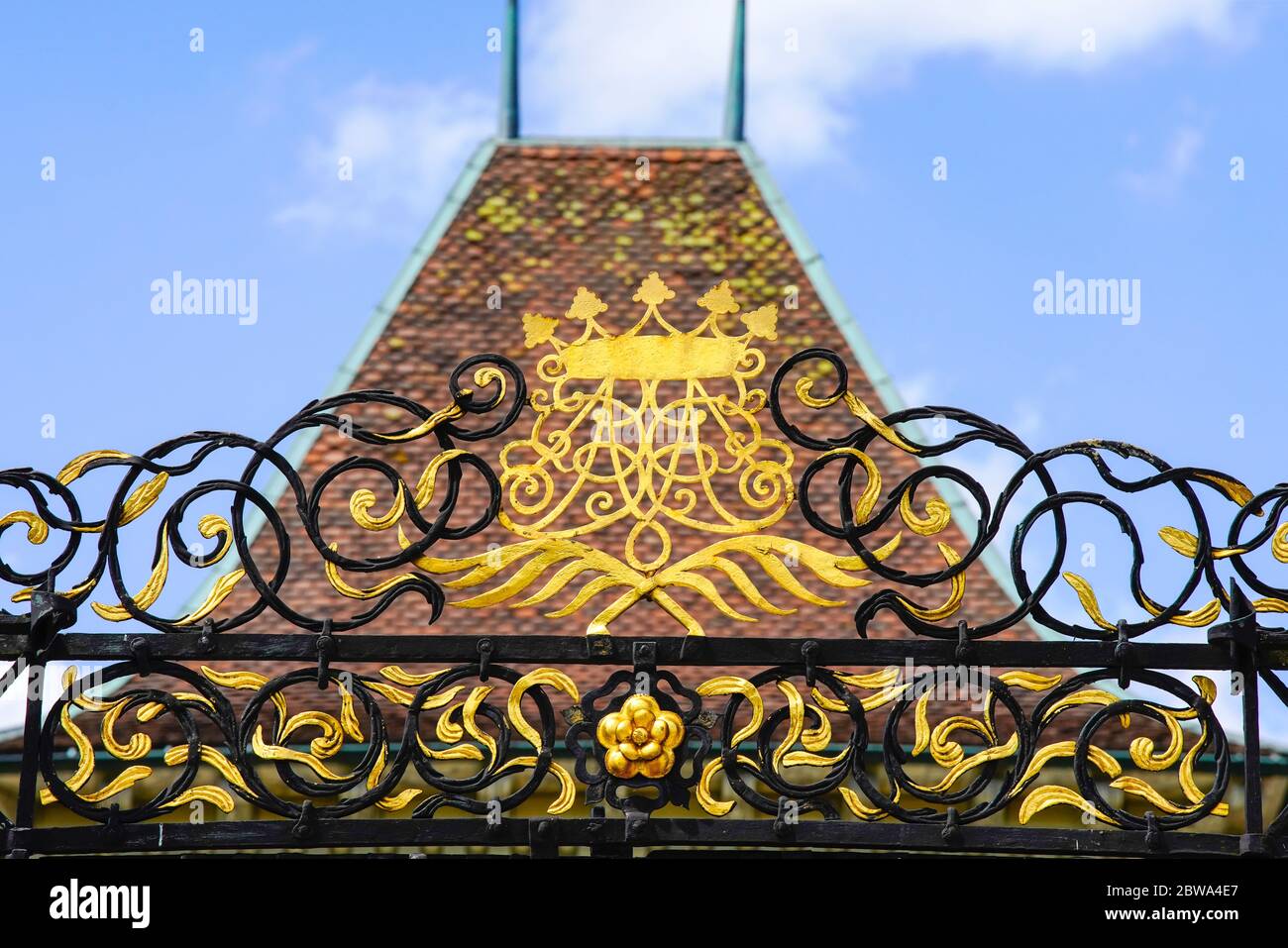 Royal emblem on an iron gate outside Waldegg Castle, Solothurn canton, Switzerland. Stock Photo