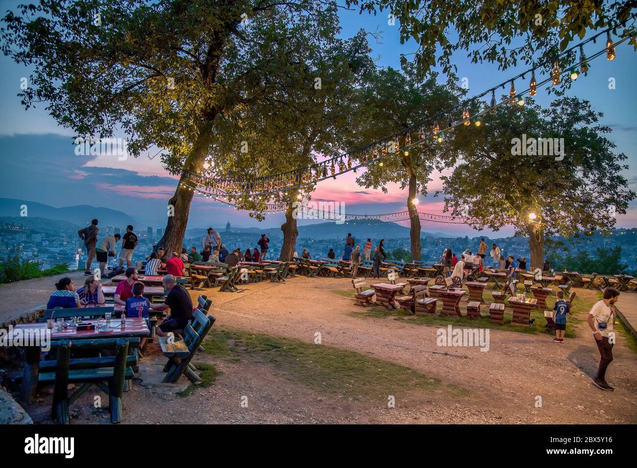 People waiting for sunset at Sarajevo's famous lookout point at the Yellow Fortress or Zuta Tabija, Vratnik.Sarajevo,Bosnia and Herzegovina Stock Photo