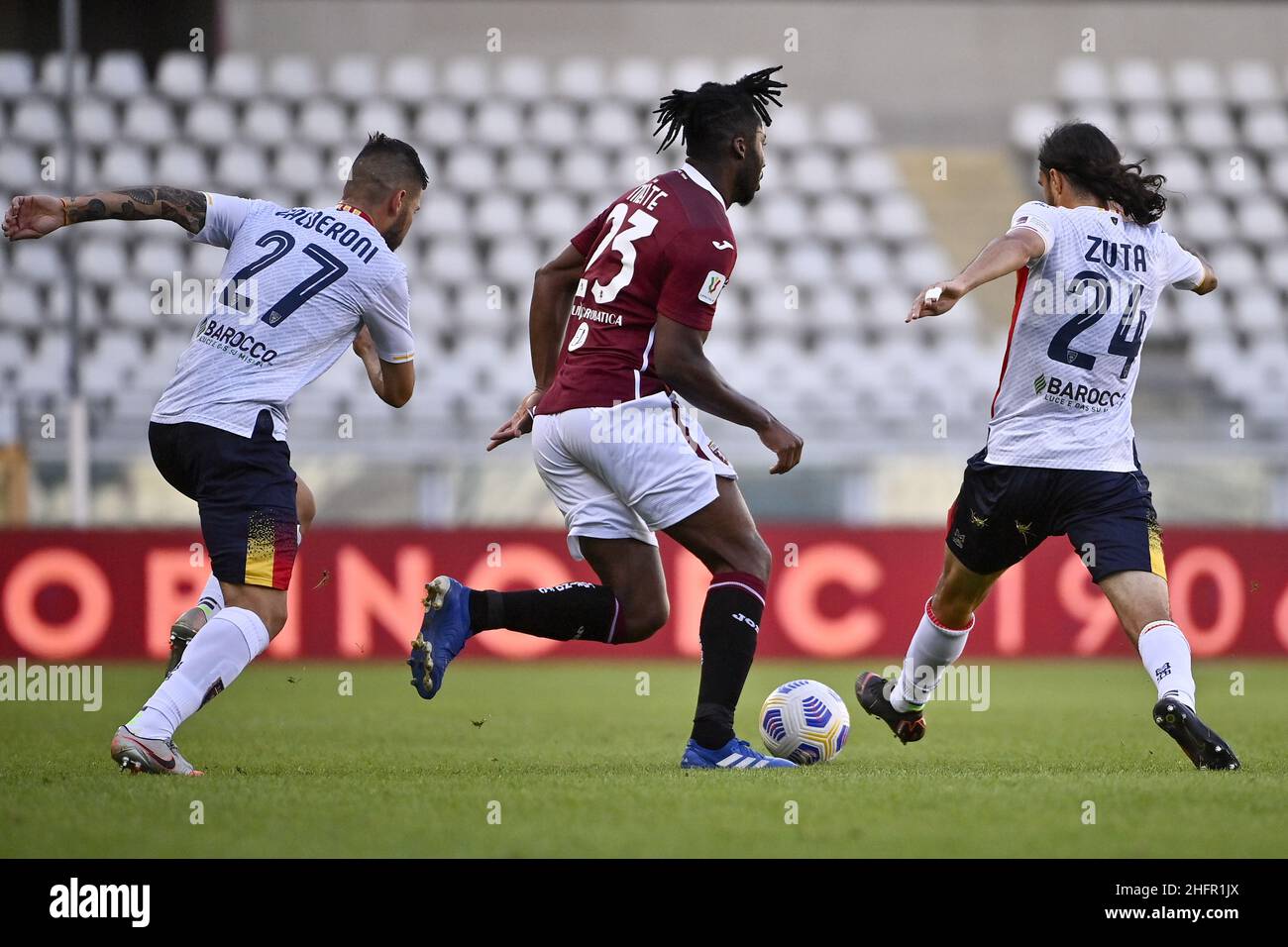 Marco Alpozzi/LaPresse October 28, 2020 Turin, Italy sport soccer EXCLUSIVE TORINO FC Torino vs Lecce - Italian Cup 2020/2021 - Olimpico Grande Torino stadium. In the pic: Marco Calderoni (U.S. Lecce); Soualiho Meite (Torino F.C.); Leonard Zuta (U.S. Lecce); Stock Photo