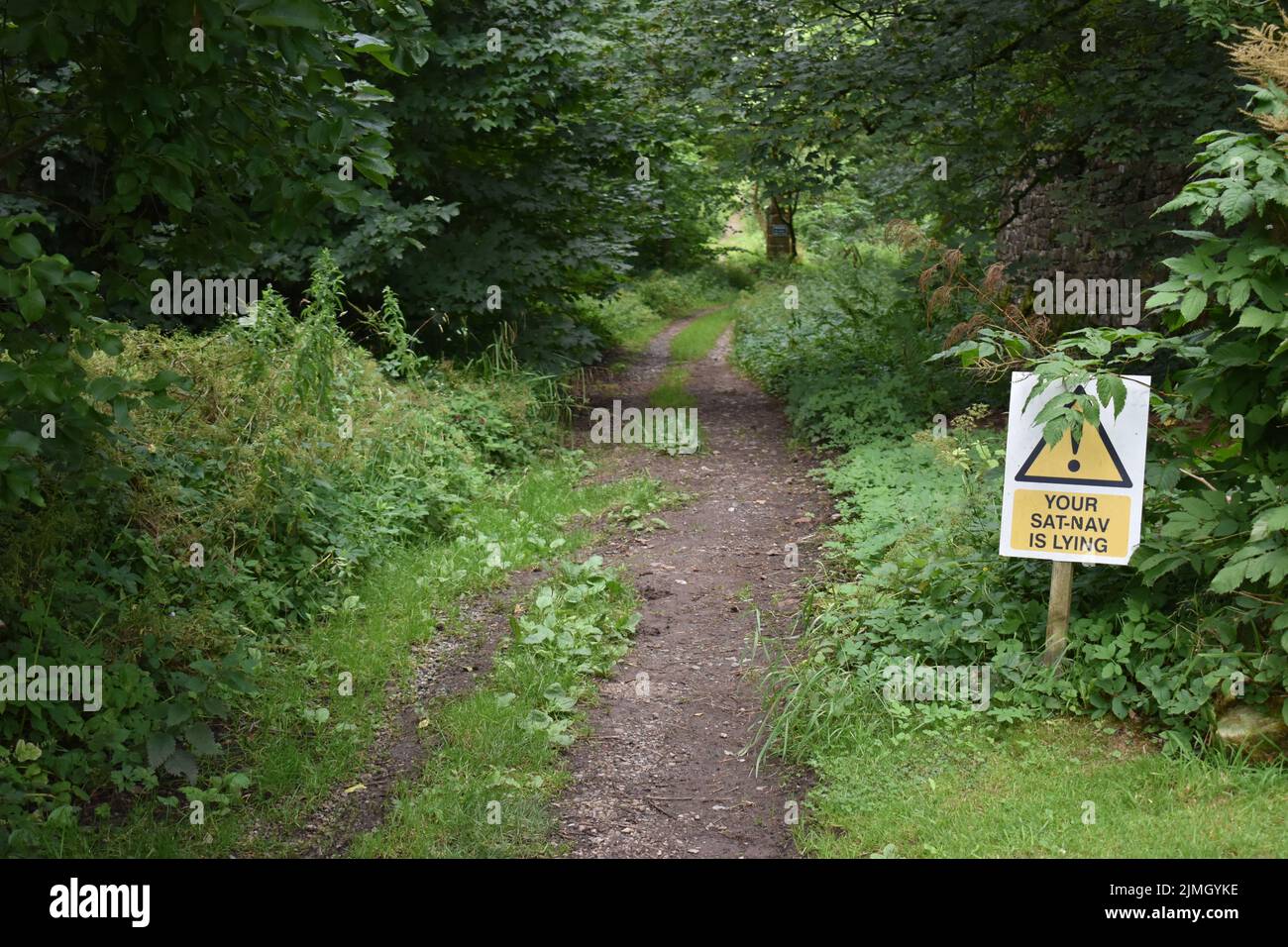 A sign in the Lake District: 'Your Sat Nav is Lying'. Stock Photo