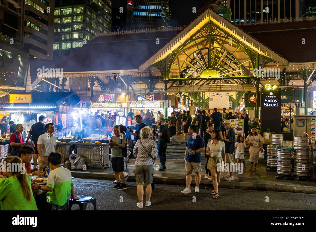 Satay Street, Lau Pa Sat in Singapore: a historic landmark transformed into a lively night food street, famous for its satay stalls, hawker dishes, Stock Photo