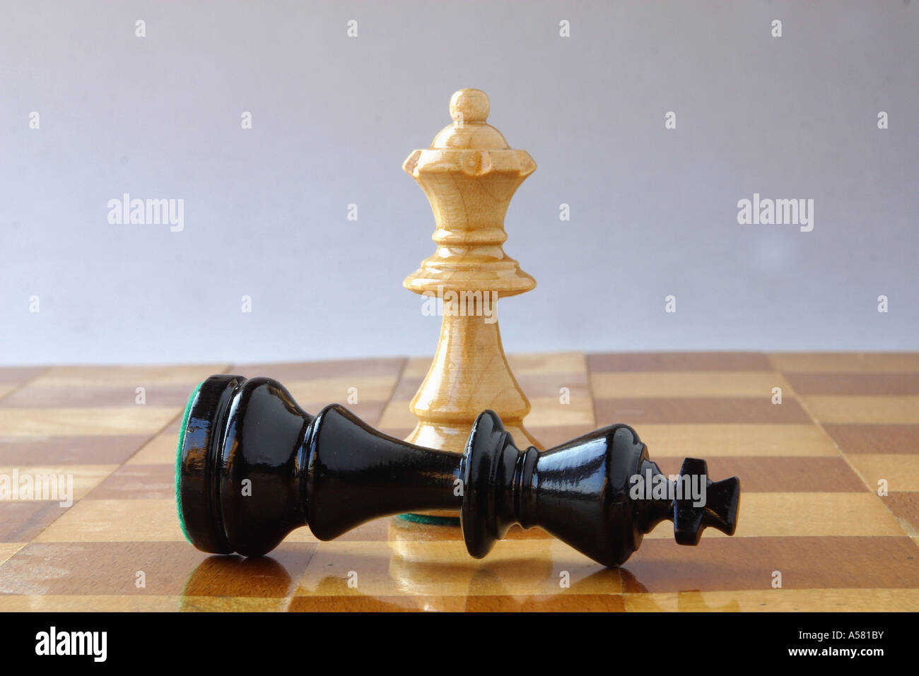 Chess, white queen, black king, mate Stock Photo