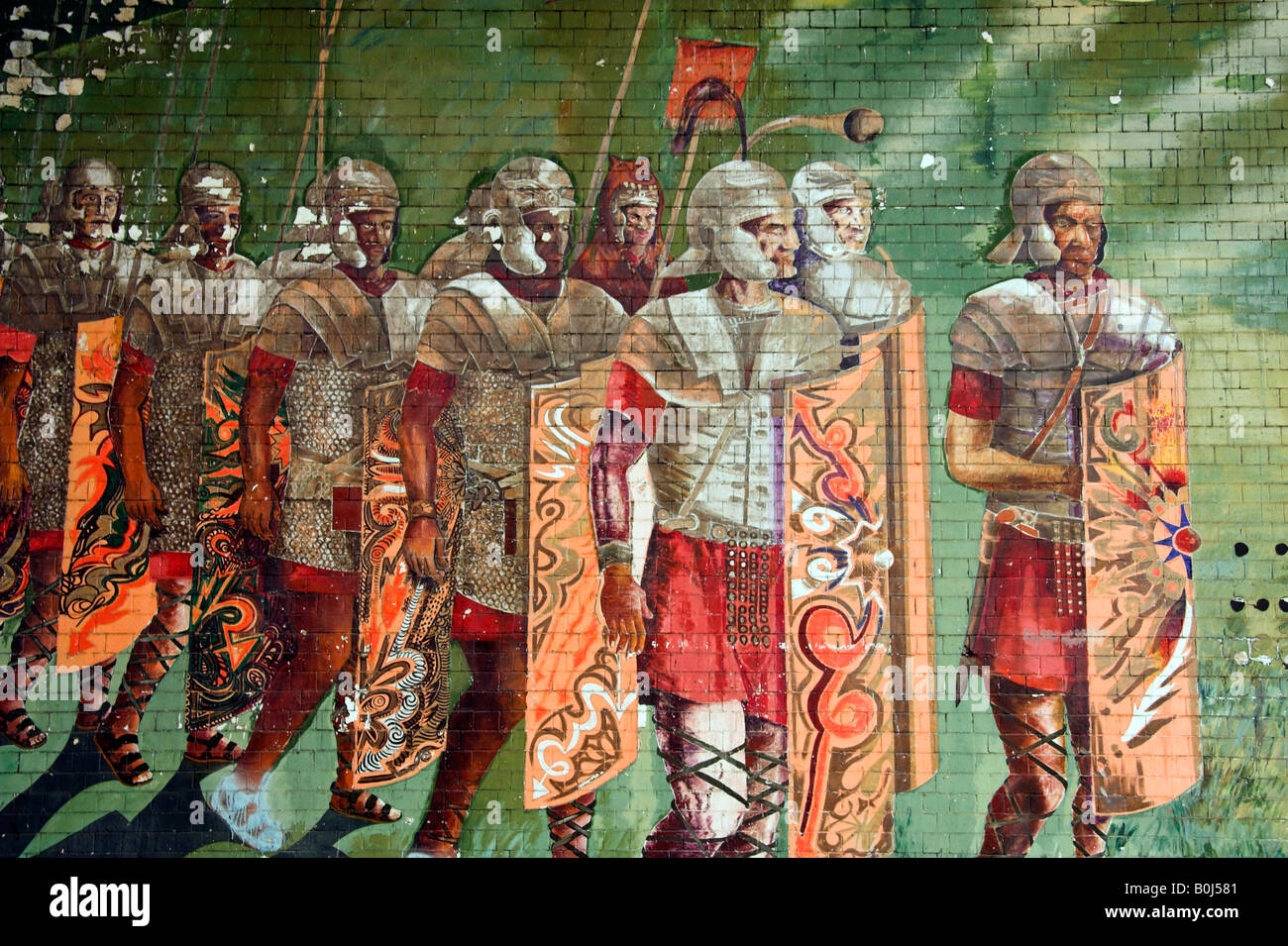 Painted mural of soldiers on a wall, Beaufort Street, Castlefield, Manchester, UK Stock Photo