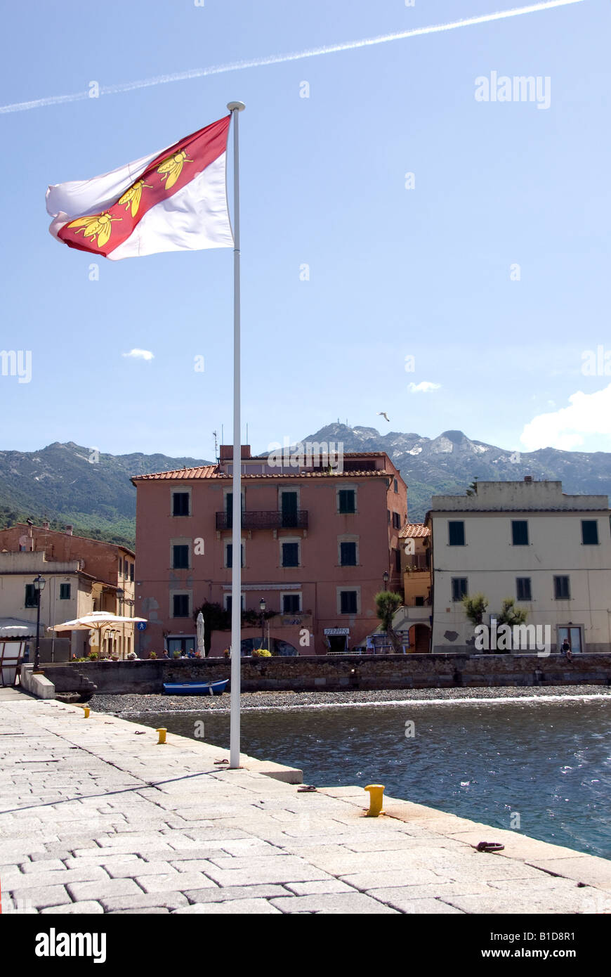 The flag of Elba three bees designed by Napoleon in Marina Marciana Island of Elba, Tuscany Italy Stock Photo