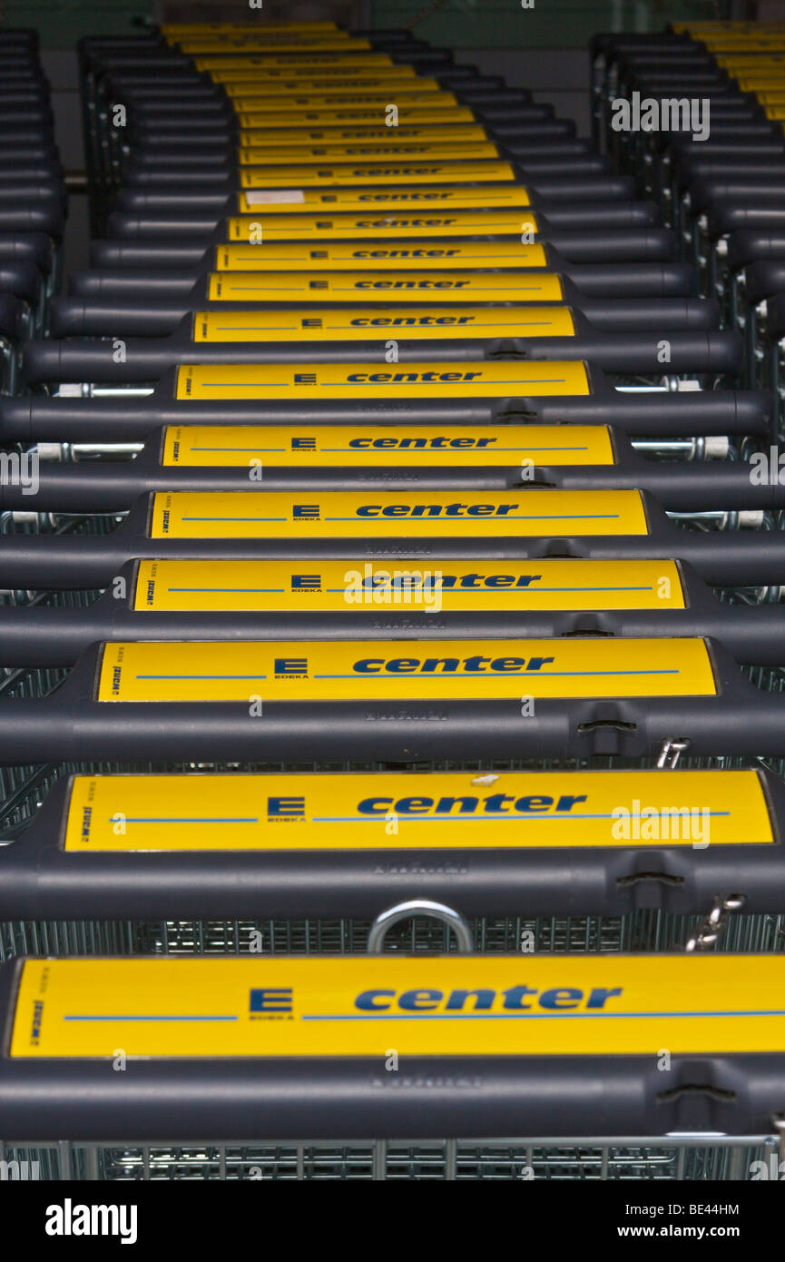 Shopping trolleys pushed into each other at an Edeka store Stock Photo