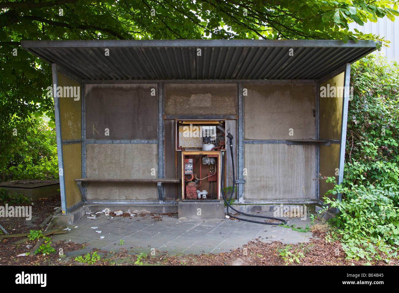 Uncovered gas pump in a small shelter on the factory premises of the former Deutsche Norton GmbH, manufacturer of abrasive mate Stock Photo