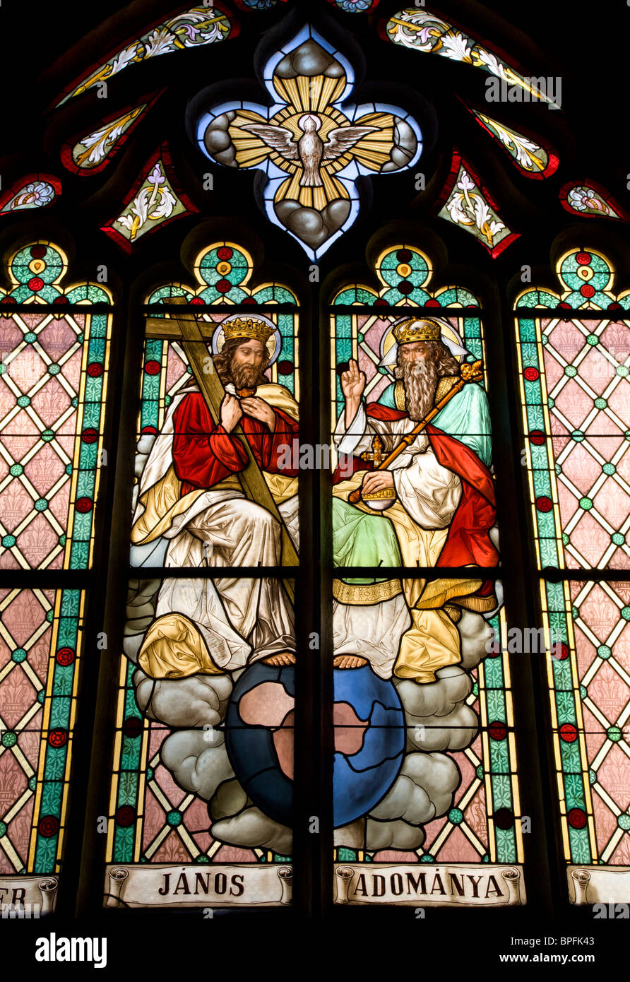 Banska Stiavnica - Holy Trinity from windowpane - st. Katharine church Stock Photo