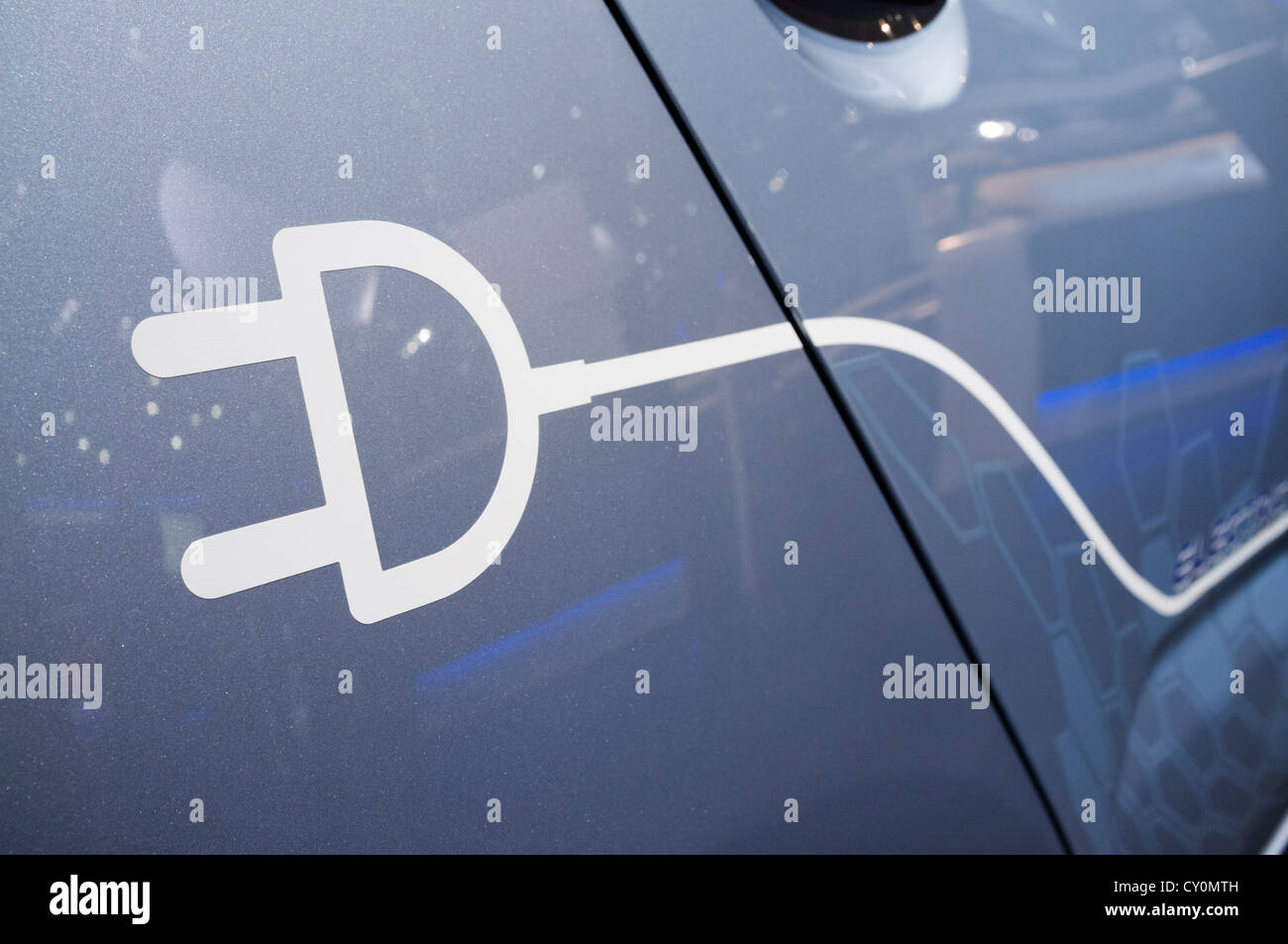 Detail of symbol on electric car for plug-in recharging at Paris Motor Show 2012 Stock Photo