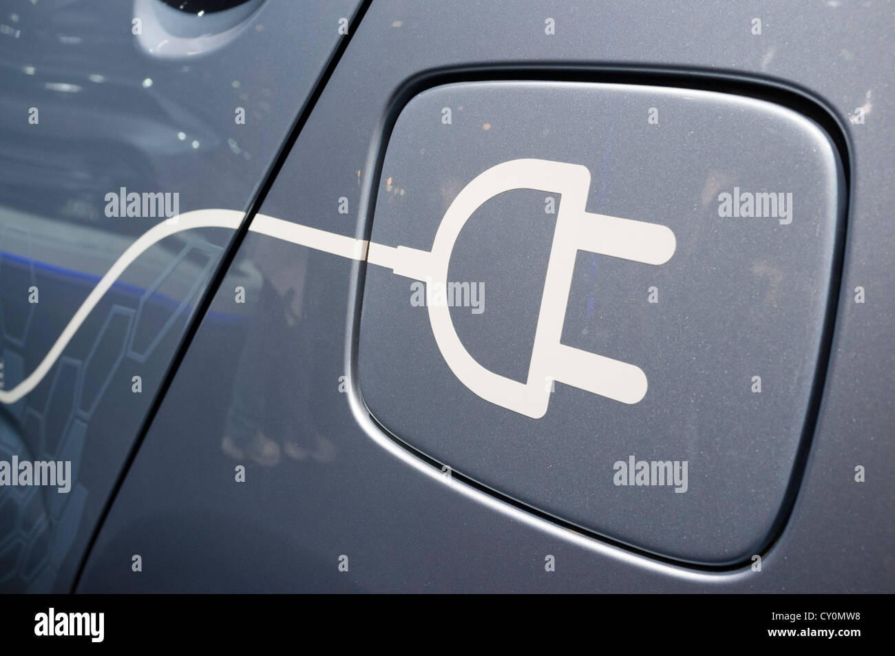 Detail of symbol on electric car for plug-in recharging at Paris Motor Show 2012 Stock Photo