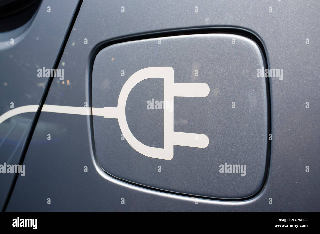 Detail of symbol on electric car for plug-in recharging at Paris Motor Show 2012 Stock Photo