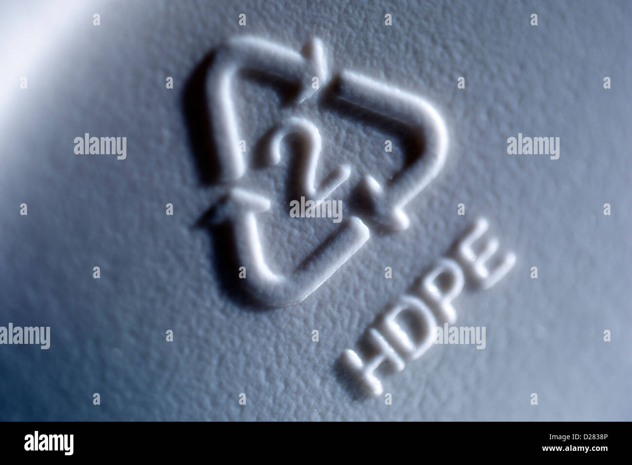 Close up of recycle symbol on gray plastic container Stock Photo