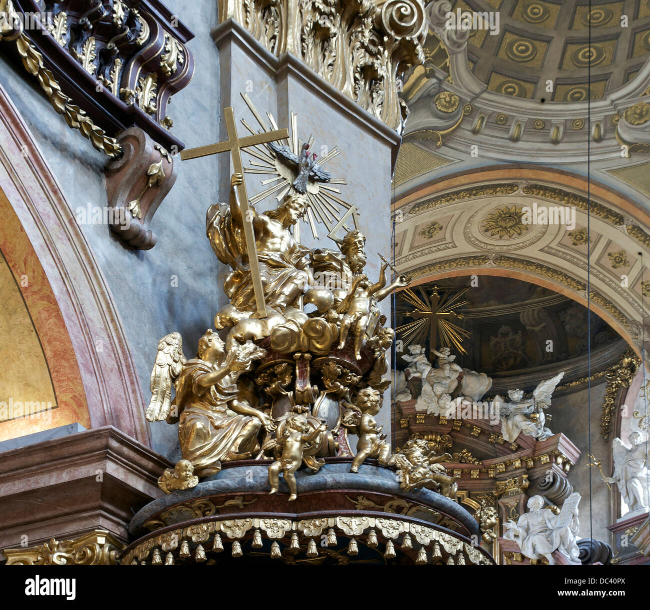 The Holy Trinity, at the top of the pulpit of the 'Peterskirche' in Vienna, Austria. Stock Photo