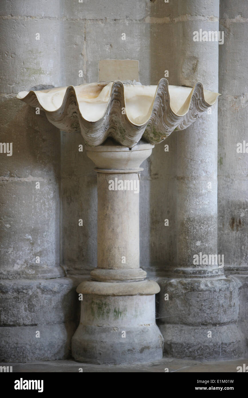 Font in  in Holy Trinity abbey Stock Photo