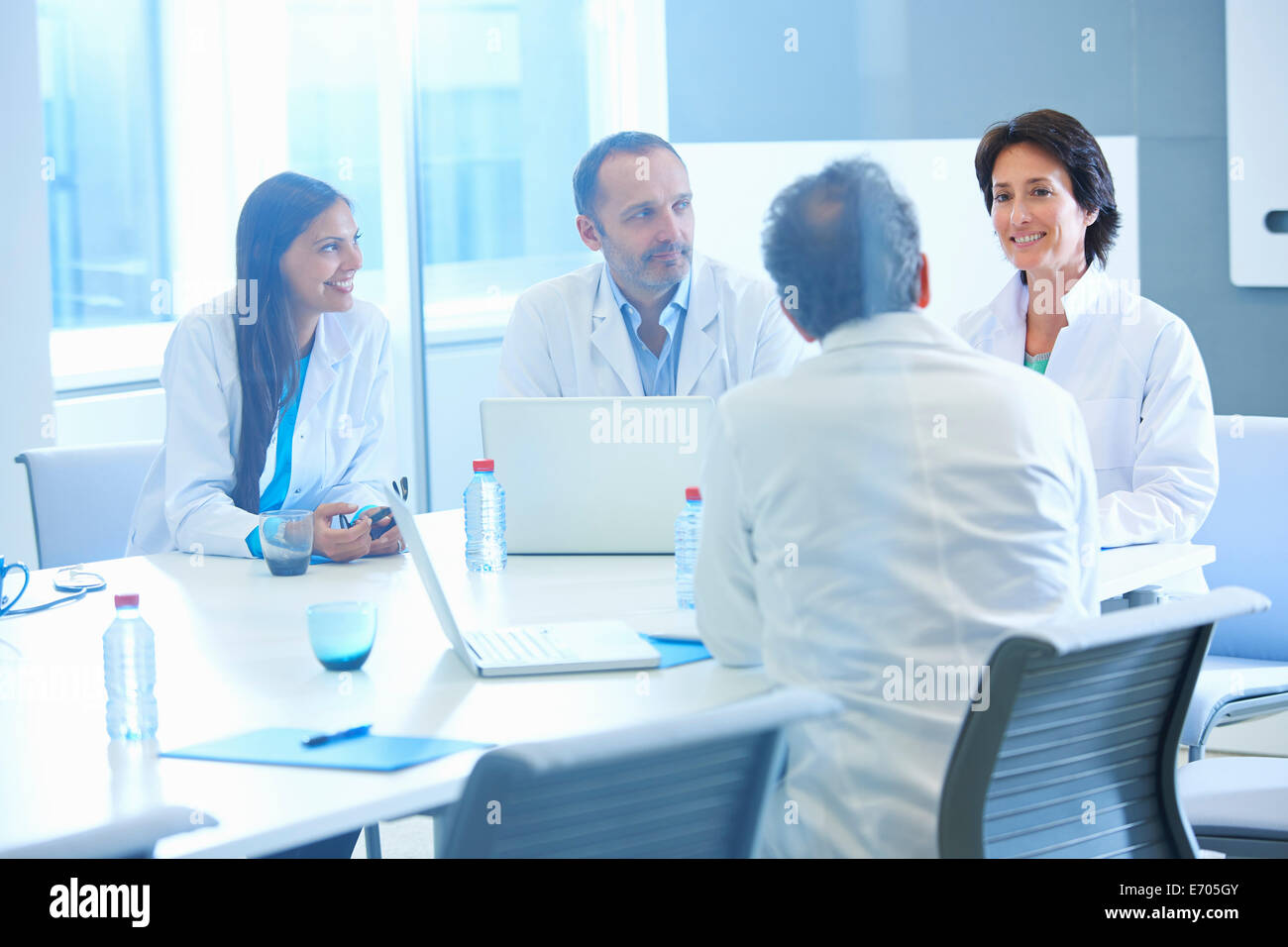 Group of researchers having meeting Stock Photo