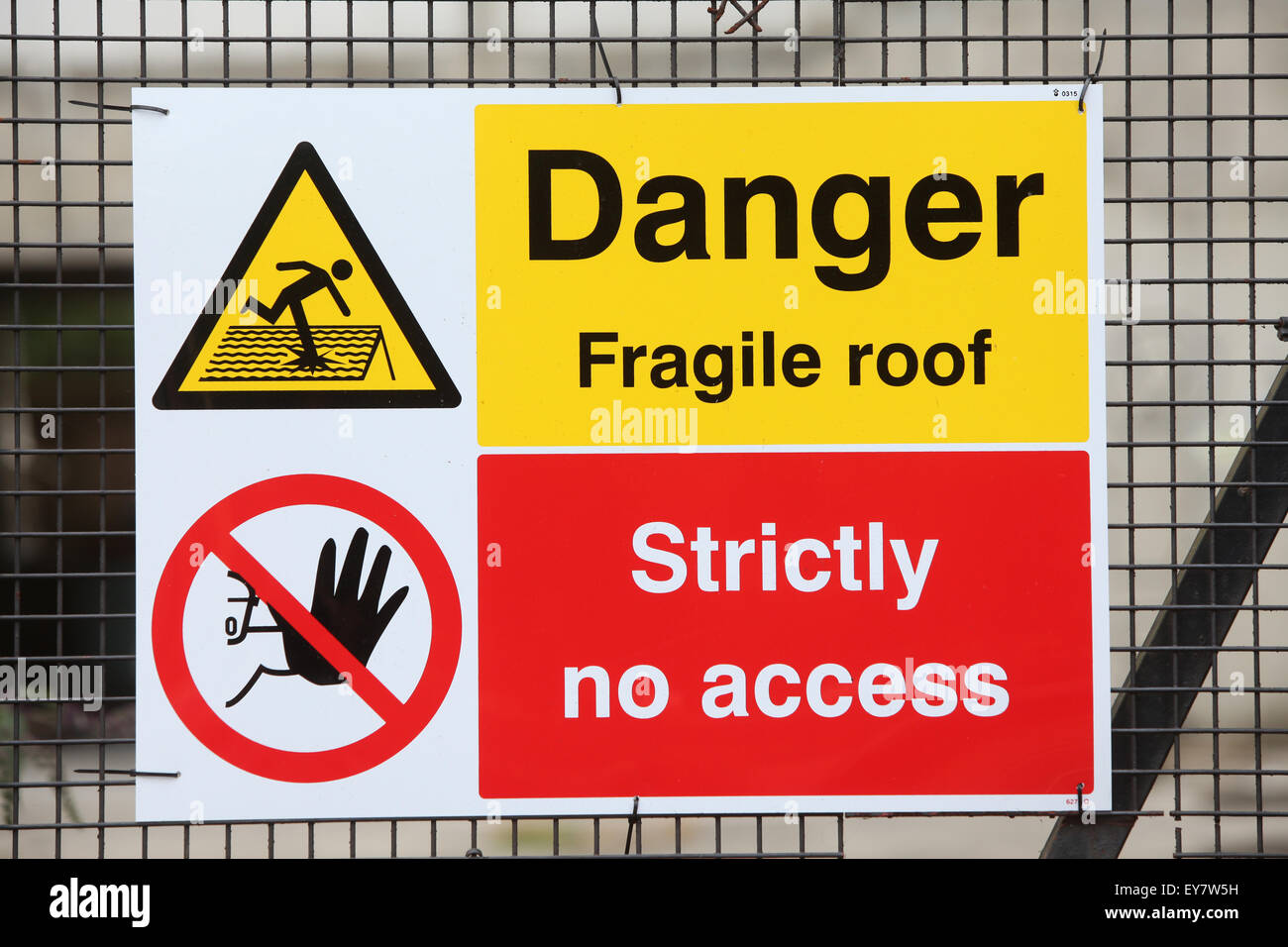 Building site safety signs Danger fragile roof strictly no access Stock Photo