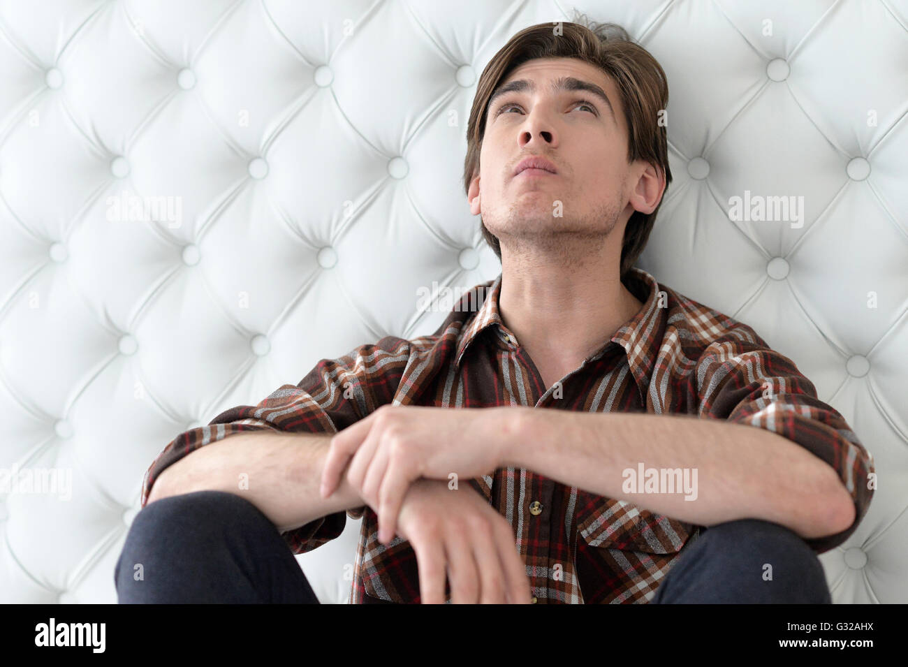 Thoughtful young man Stock Photo