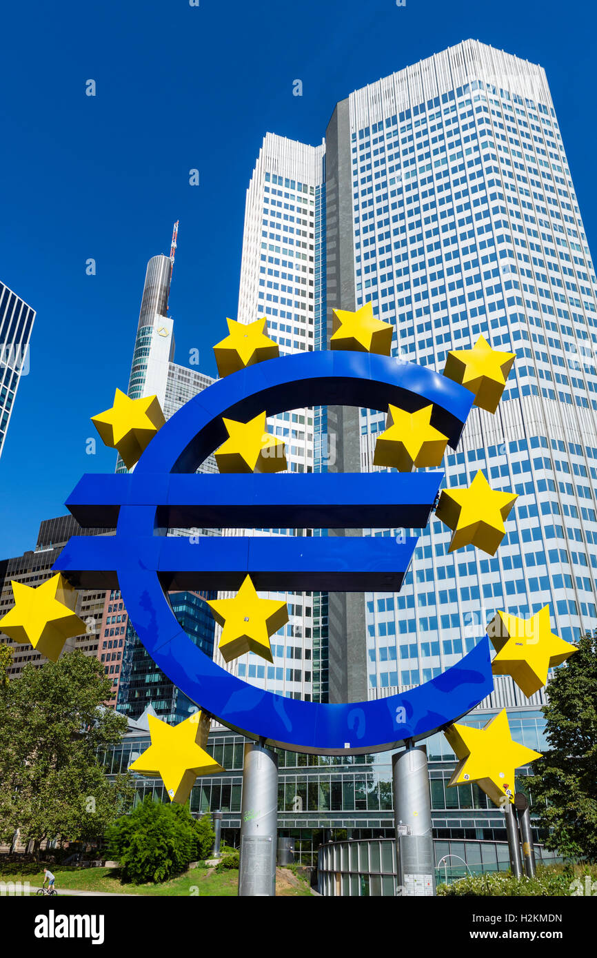 The Euro symbol in front of the Eurotower, Willy-Brandt-Platz, Financial District, Frankfurt, Hesse, Germany Stock Photo