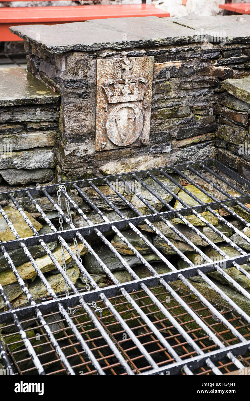 An ancient well with the royal emblem. Bergen. Norway Stock Photo