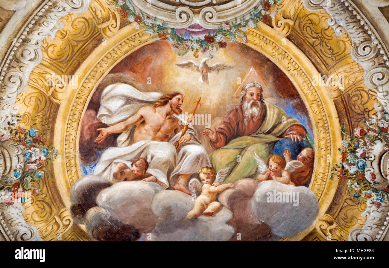 PARMA, ITALY - APRIL 16, 2018: The ceiling freso of The Holy Trinity in church Chiesa di Santa Croce by Giovanni Maria Conti della Camera Stock Photo