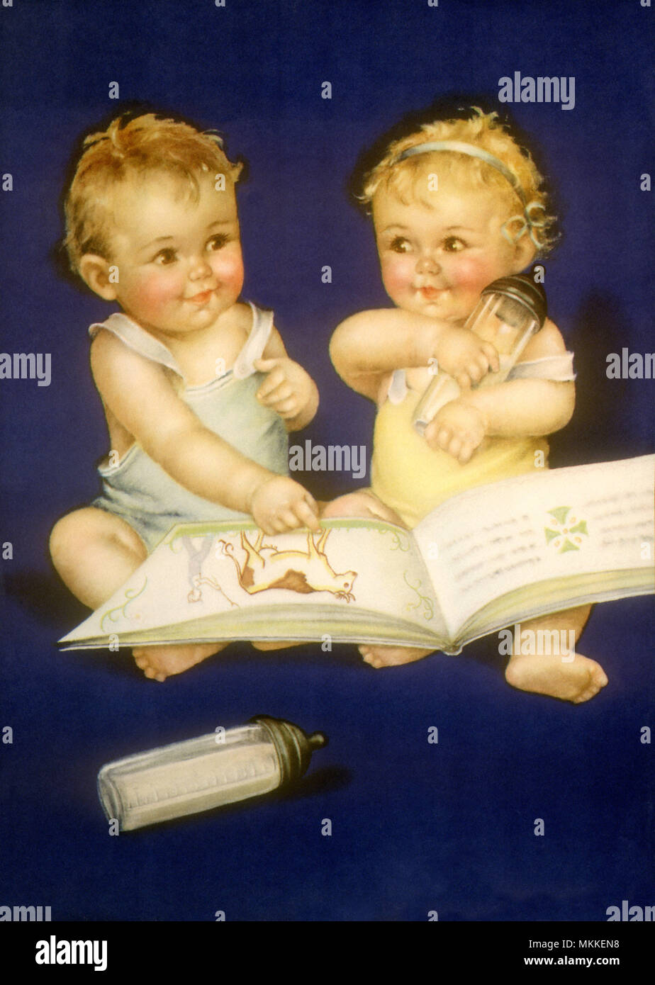 Babies and Picture Book Stock Photo