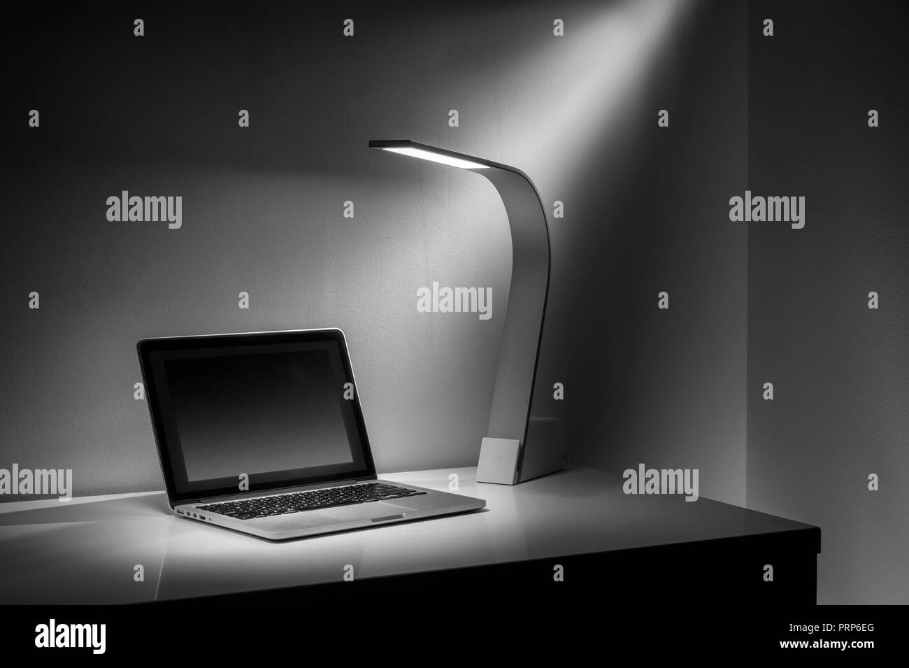 Modern Sleek Design Desk Light & Laptop Computer Stock Photo