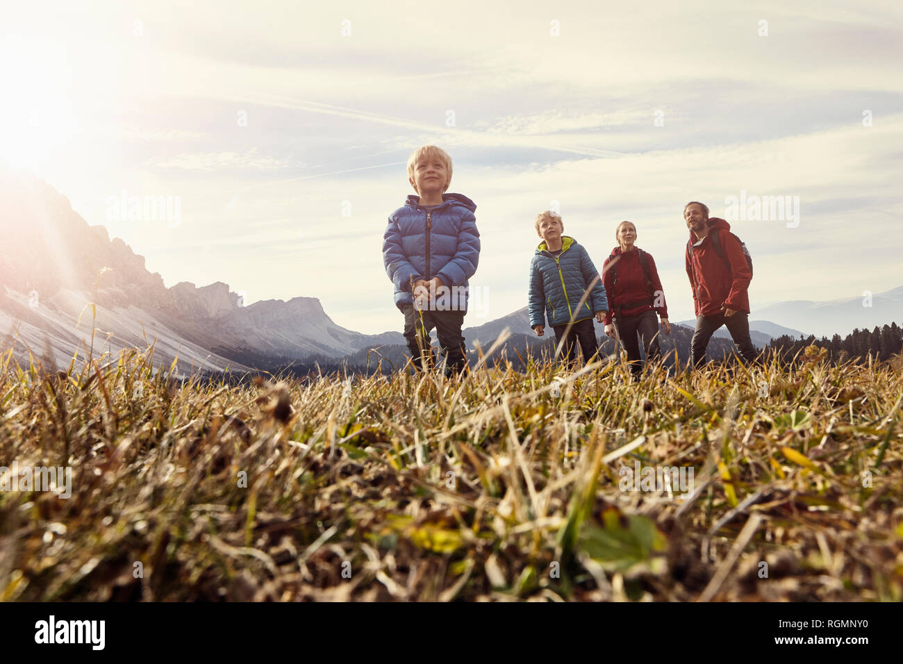 Italy, South Tyrol, Geissler group, family hiking Stock Photo