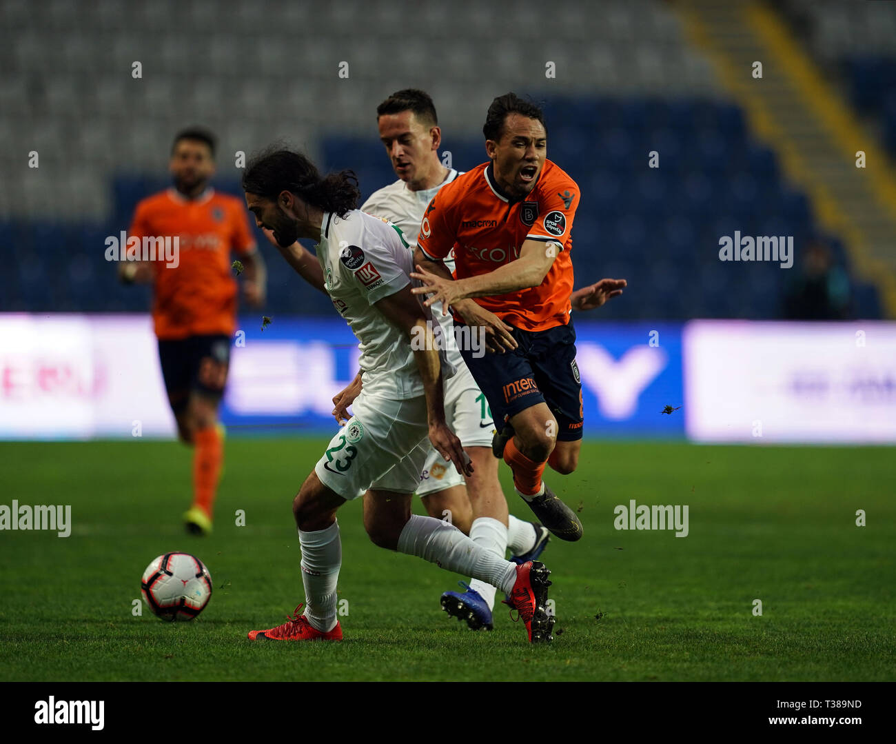 Istanbul, Turkey. 7th Apr, 2019. M''¡rcio Mossor''” fouled by Leonard Zuta during ?stanbul Ba?ak?ehir v Konyaspor at the Ba?ak?ehir Fatih Terim Stadium in Istanbul, Turkey. Ulrik Pedersen/CSM/Alamy Live News Stock Photo