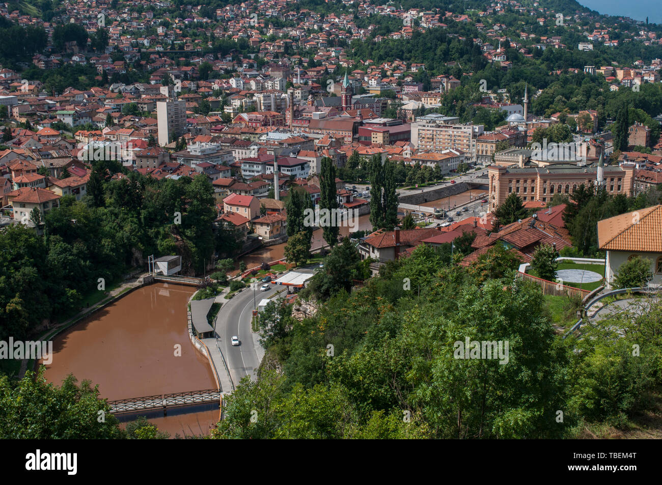 Sarajevo, Bosnia: aerial view of the skyline of the city with the Dinaric Alps and Miljacka River, seen from the top of Zuta Tabija (Yellow Fortress) Stock Photo