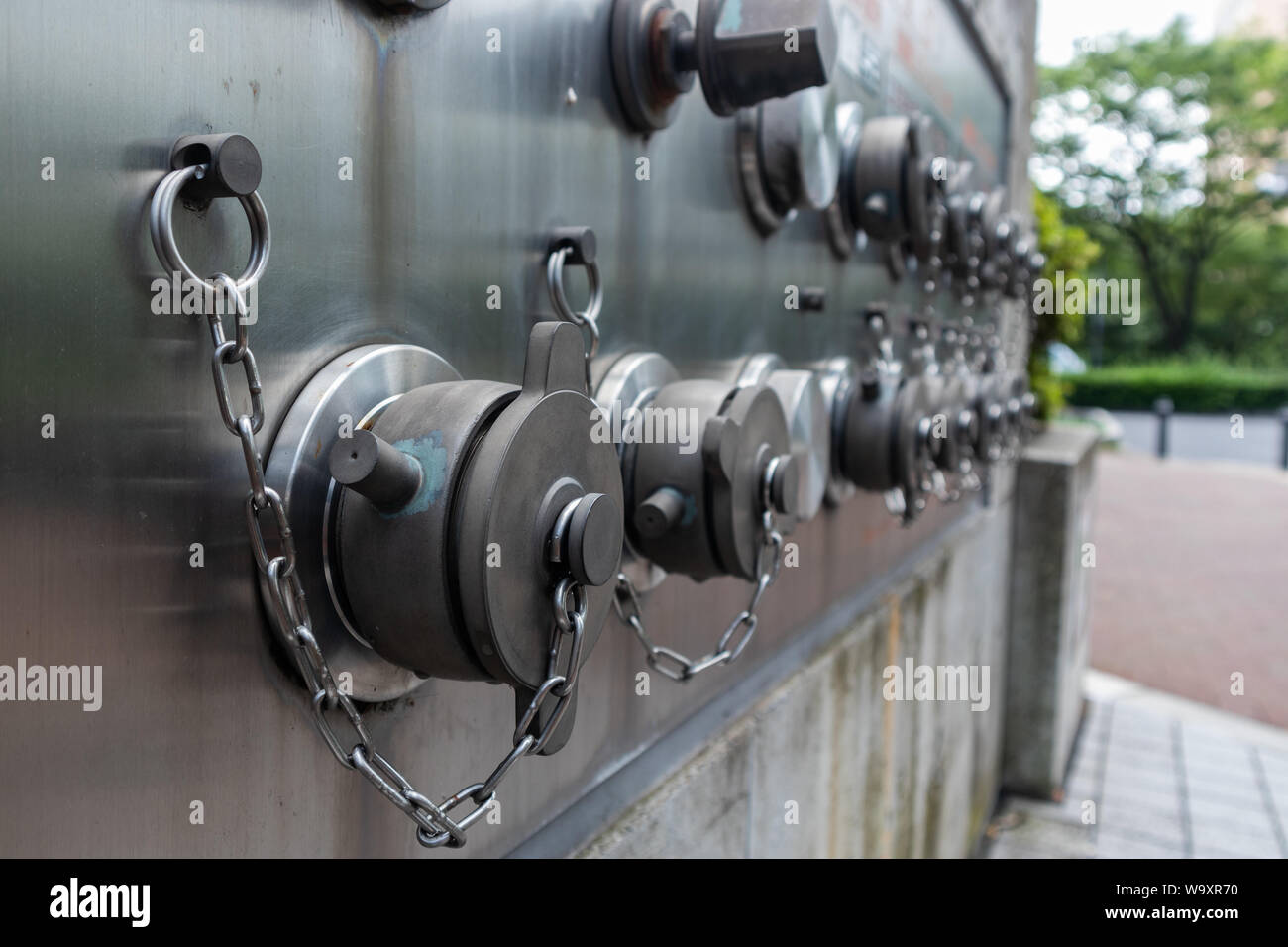 Modern sleek fire hydrant on the street of Tokyo. Stock Photo