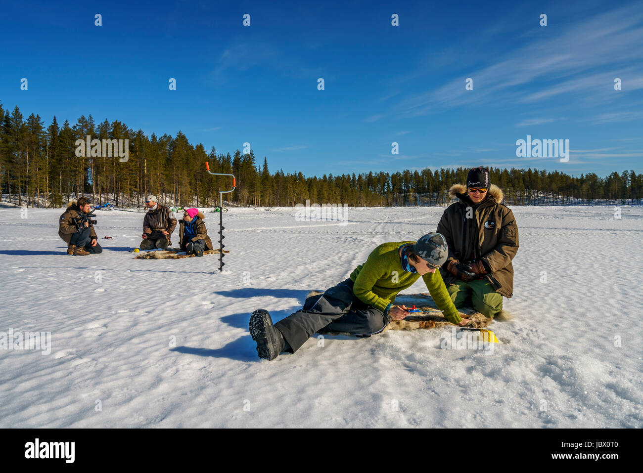 Eis Angeln, Kangos, Lappland, Schweden Stockfoto