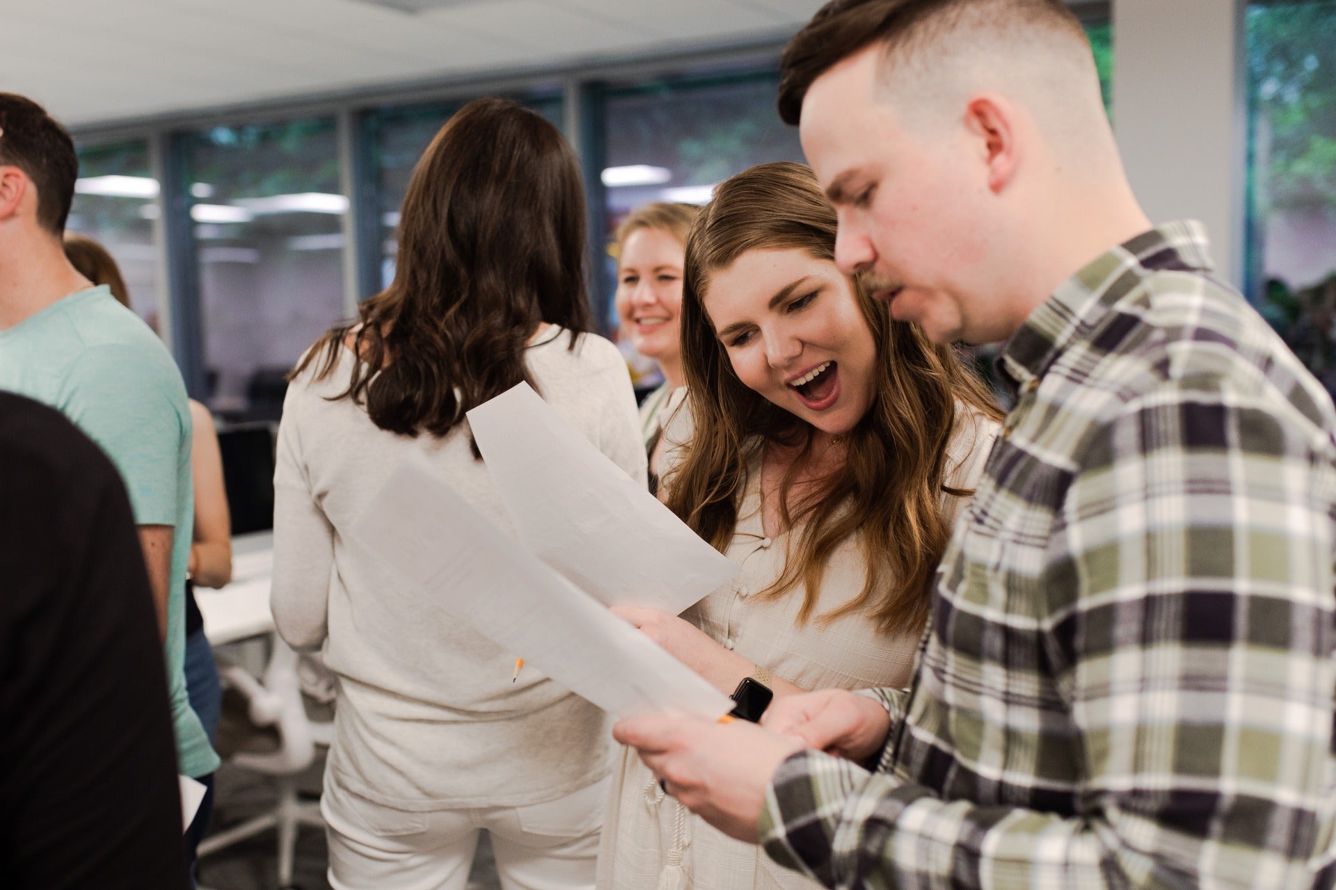 Group of workers in a  happy discussion