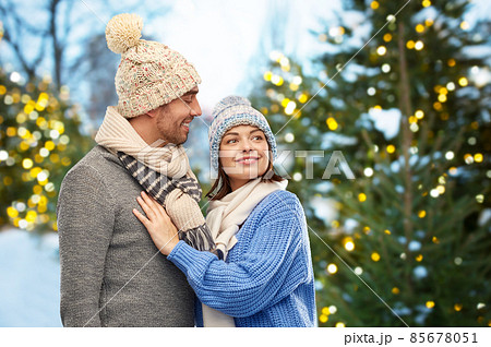 happy couple in winter clothes 85678051